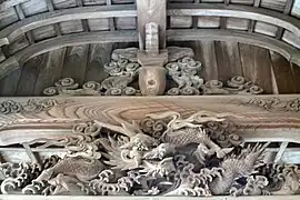 Dragon Sculpture on Building Roof