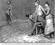 Sur la piste du cirque de Sleary, Gradgrind, assis, effondré