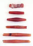 Perles en cornaline mises au jour à Suse (Iran). Musée du Louvre.