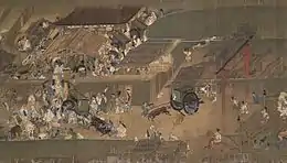 Foule très dense et animée qui occupe tout l’espace, se pressant autour de plusieurs petits bâtiments.