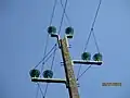 Isolateurs trois pièces scellées sur ligne 20kV.