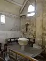 Bas-côté sud, 1re&nbsp;travée, fonts baptismaux.
