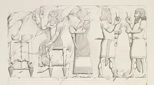 Scène de banquet. Bas-relief de la salle 2.