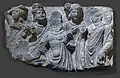 Buddha (à D.) avec quatre personnages. Gandhara, Pakistan actuel. Art gréco-bouddhique Ier – Ve&nbsp;siècle. Schiste gris bleu, H. 16&nbsp;cm.