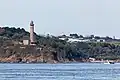 Vue du phare et à l'est du port de la Maison blanche (la centrale électrique souterraine du Portzic à l'ouest est non visible) depuis la rade.