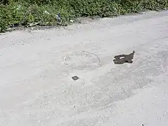 La tête de puits matérialisée.