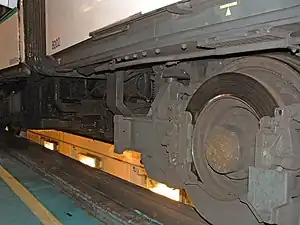 À droite : essieux orientables de MF 88.