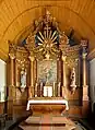 Le maître-autel et le retable de l'église.