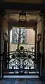 Casa Guazzoni, entrée avec grille de Mazzucotelli