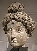 Tête de Bouddha ou d'un Bodhisattva. Afghanistan, Ve ou VIe siècle. (Page du musée).