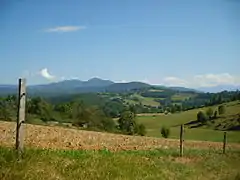 La campagne et le tuc de la Courate vue depuis la route de Saint-Lizier (ancienne voie romaine).