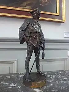 Écolier au XIVe siècle, bronze, Gray, musée Baron-Martin.