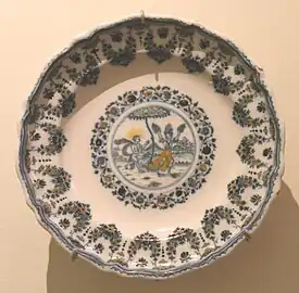 Assiette circulaire, Apollon et Daphné.