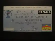 Plan serré sur le ticket.