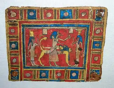 Osiris sur son lit funéraire, cartonnage de momie, époque ptolémaïque.