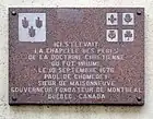 Plaque en son honneur sur le lieu de son inhumation.