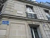 Plaque commémorative d'Auguste Chapuis au no&nbsp;38, rue de Prony.