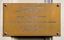 Plaque en mémoire de l'ancien monastère des Bénédictines fondé par Catherine de Bar au no 10.