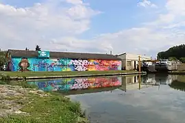 Fresques réalisées en 2019 sur la salle du port.