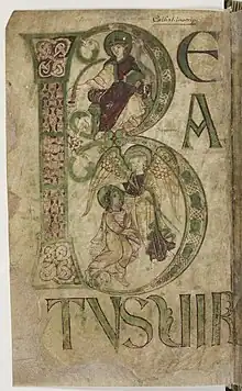 Première page d'un manuscrit enluminé, présentant le mot latin Beatus.