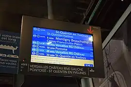 Écran d'affichage du temps d'attente des prochains trains.