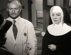 Avec Robert Douglas dans Tempête sur la colline (1951).