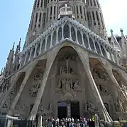 Façade de la passion.1954-1976Fronton installé en 2015[réf.&nbsp;souhaitée]Croix majestueuse en 2018[réf.&nbsp;souhaitée].