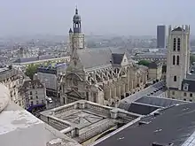  Saint-Étienne du Mont vue depuis le Panthéon (sorte de vue aérienne) avec à droite la tour Clovis du Lycée Henri IV.