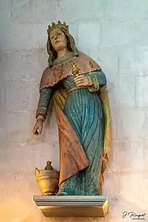 Sculpture en bois polychrome de Sainte Marthe.