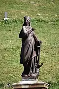 Statue de sainte Philomène, guide des pèlerinages nationaux au sanctuaire.