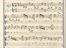 partition manuscrite rehaussée de couleurs passées, cadre bleu à droite et à gauche