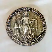 1293 : Adolphe de Nassau l'élève au rang de ville impériale.