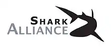 Le logo de Shark Alliance représentant une ombre de requin.