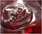 Signature d'Auguste Jean, Jean. Pastille de verre appliquée à chaud. Entre 1877 et 1884.