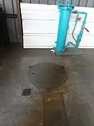 La tête de puits matérialisée.