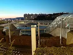 Station vu depuis la chaussée de Fleurus.(couché de soleil)