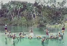 Groupe en canoë aux Salomon (1895)