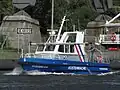 Bateau de patrouille Vossbrook de la Wasserschutzpolizei Schleswig-Holstein sur le Nord-Ostsee-Kanal.