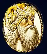 Tête d'homme au turban avec un combat d'animaux,