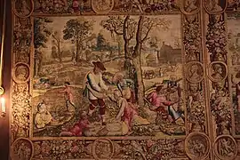 Photographie en couleurs d'une tapisserie ancienne.