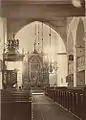 Vue intérieure de l'église en 1901. On observe que les murs en briques sont enduits en blanc