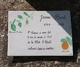 Plaque sur la tombe.