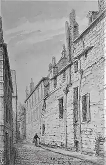 alt=Dessin en noir et blanc d'un vieux mur intégré à une habitation plus moderne.