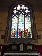 Autel et verrière axiale de l'Assomption de Marie.