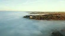 Château de Clermont. Photo Drone 2018. Le Château face à un océan de nuages un matin d'automne.