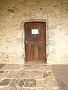 Porte en anse de panier.