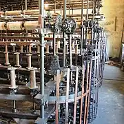 Sur les machines, d'autres engrenages permettaient de régler plus finement la vitesse.