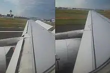 Becs et aérofreins déployés sur un A319 à l'atterrissage