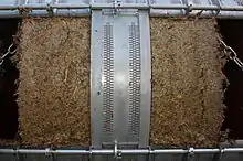 La râpe, non décompactée : raisin compressé et vidé de son jus.