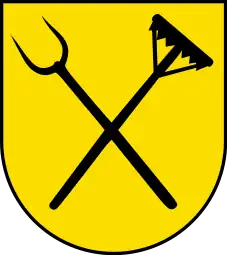 Armes de Stuttgart-Heumaden : fourche à faner et rateau à foin. Les fourches à foin n'ont que 2 ou 3 doigts.